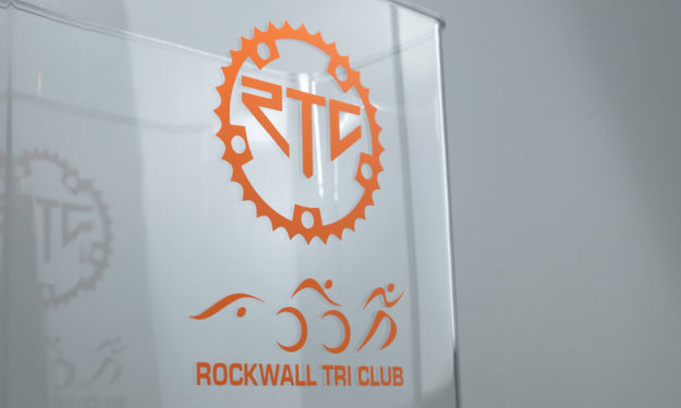 Orange Die Cut Stickers applied to plastic